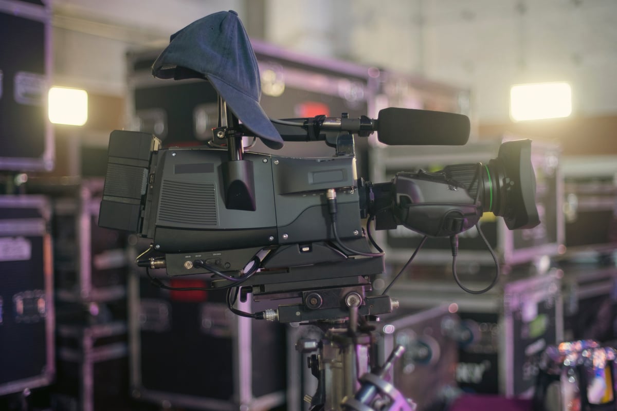 Professional camera on a stabilizer backstage on a documentary set